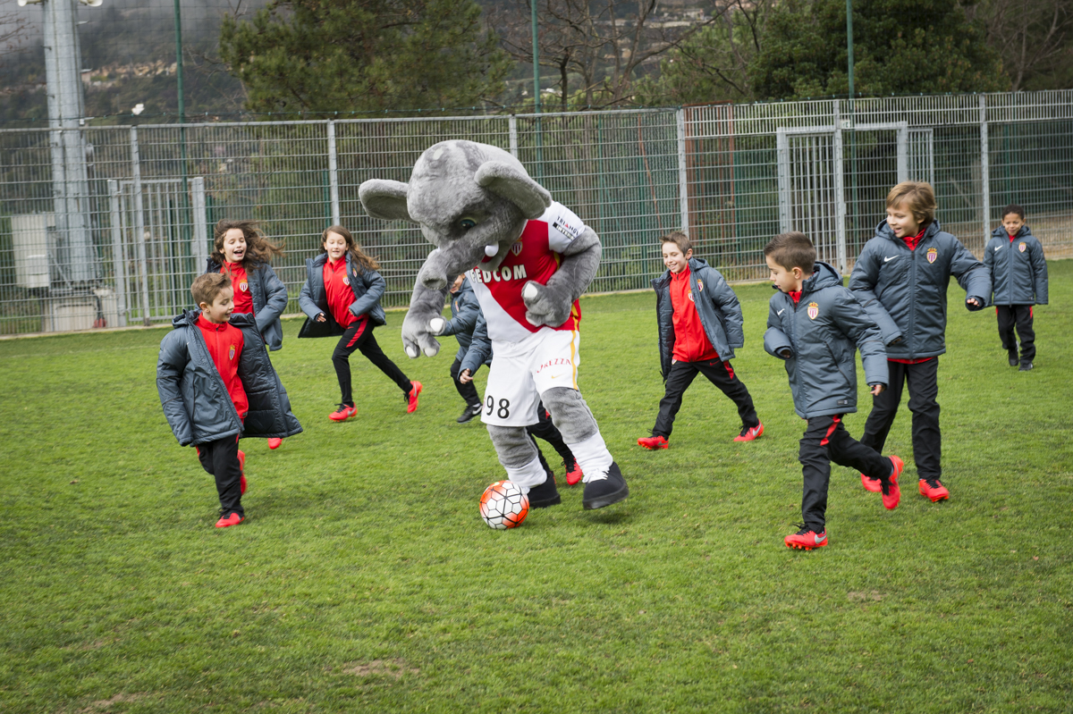 elephant mascot costume playing soccer