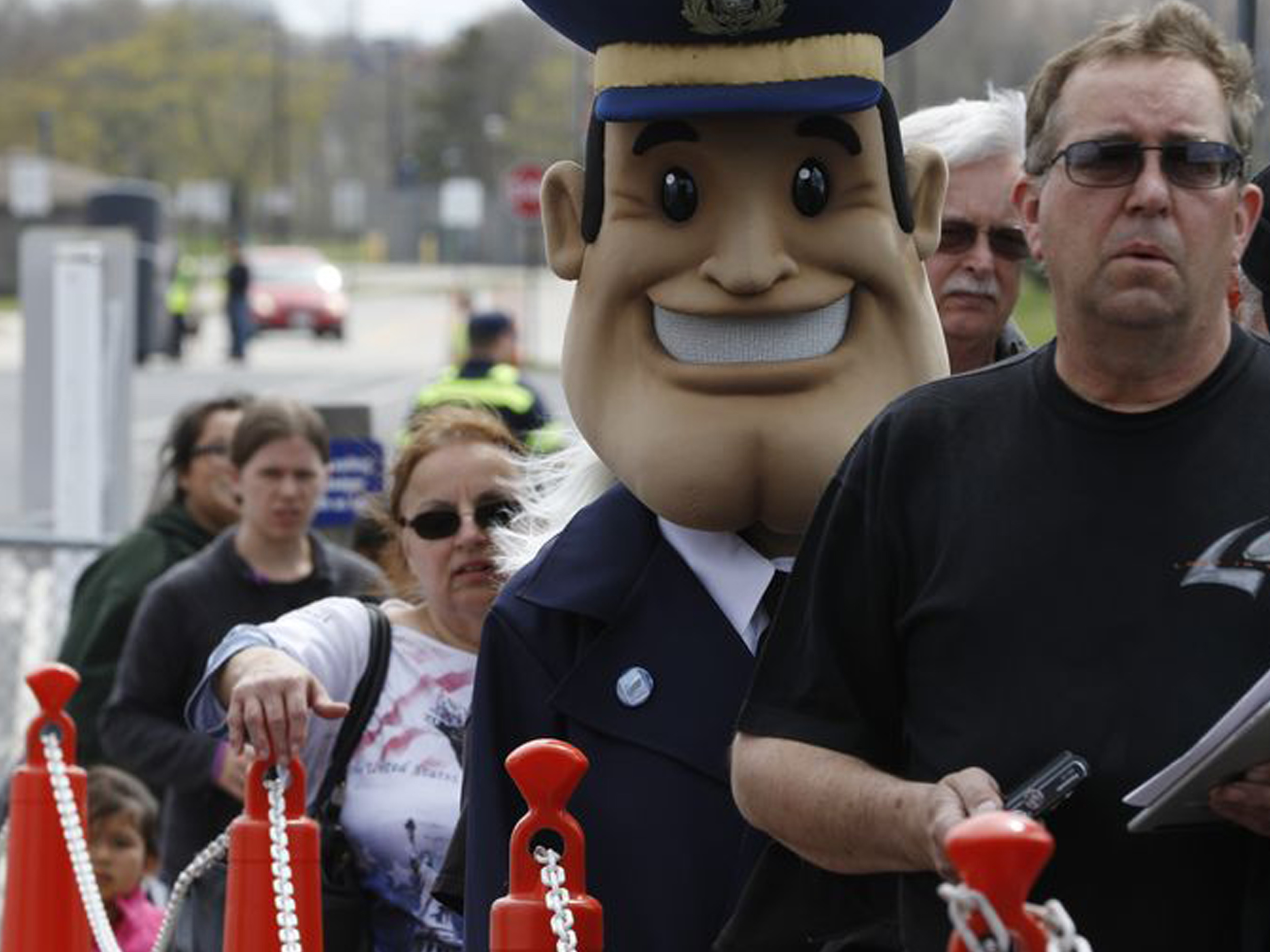 human mascot costume in line