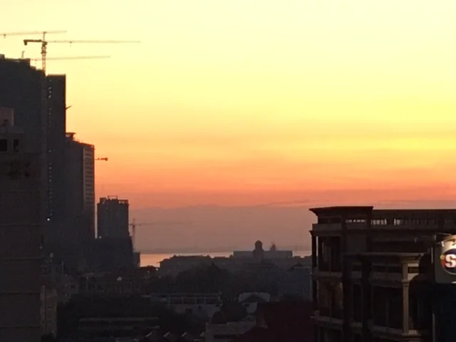 The sun rises over the Mekong River in Phnom Penh.