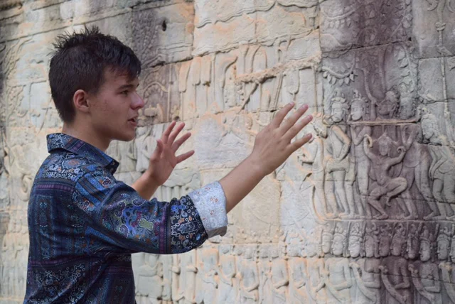 Ben gives an impromptu lecture/stand-up routine about the meaning of the bas-relief carvings on the walls of Bayon Temple. The next time you see Ben, please ask him about the legend of the Jawless King. 