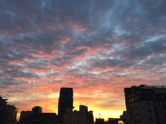 A sunrise over the Mekong River signifies new beginnings, and a new school year.
