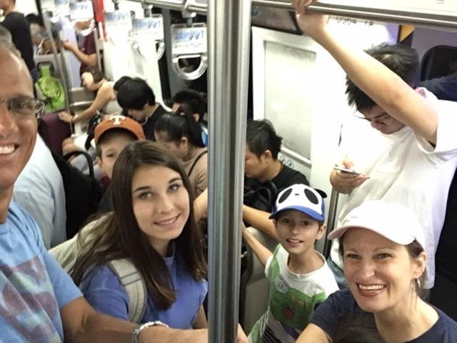 Yes, that's us. And yes, we are absolutely acing our way through the subway system in Beijing.