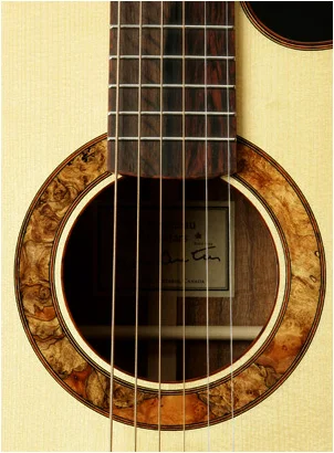 Custom soundhole inlay done in dark Burl