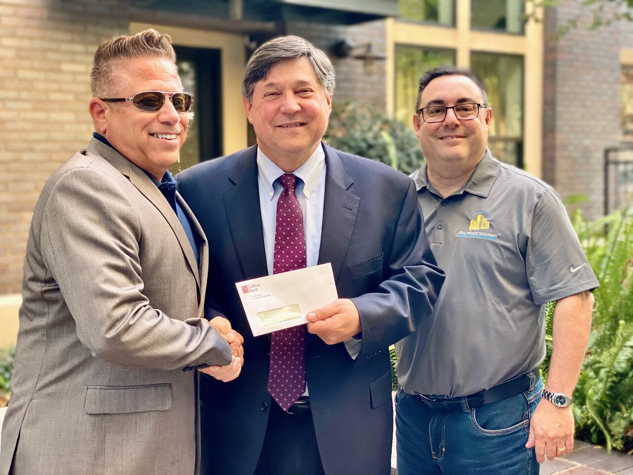 SBDC-OC presented with $10K Grant from Cathay Bank