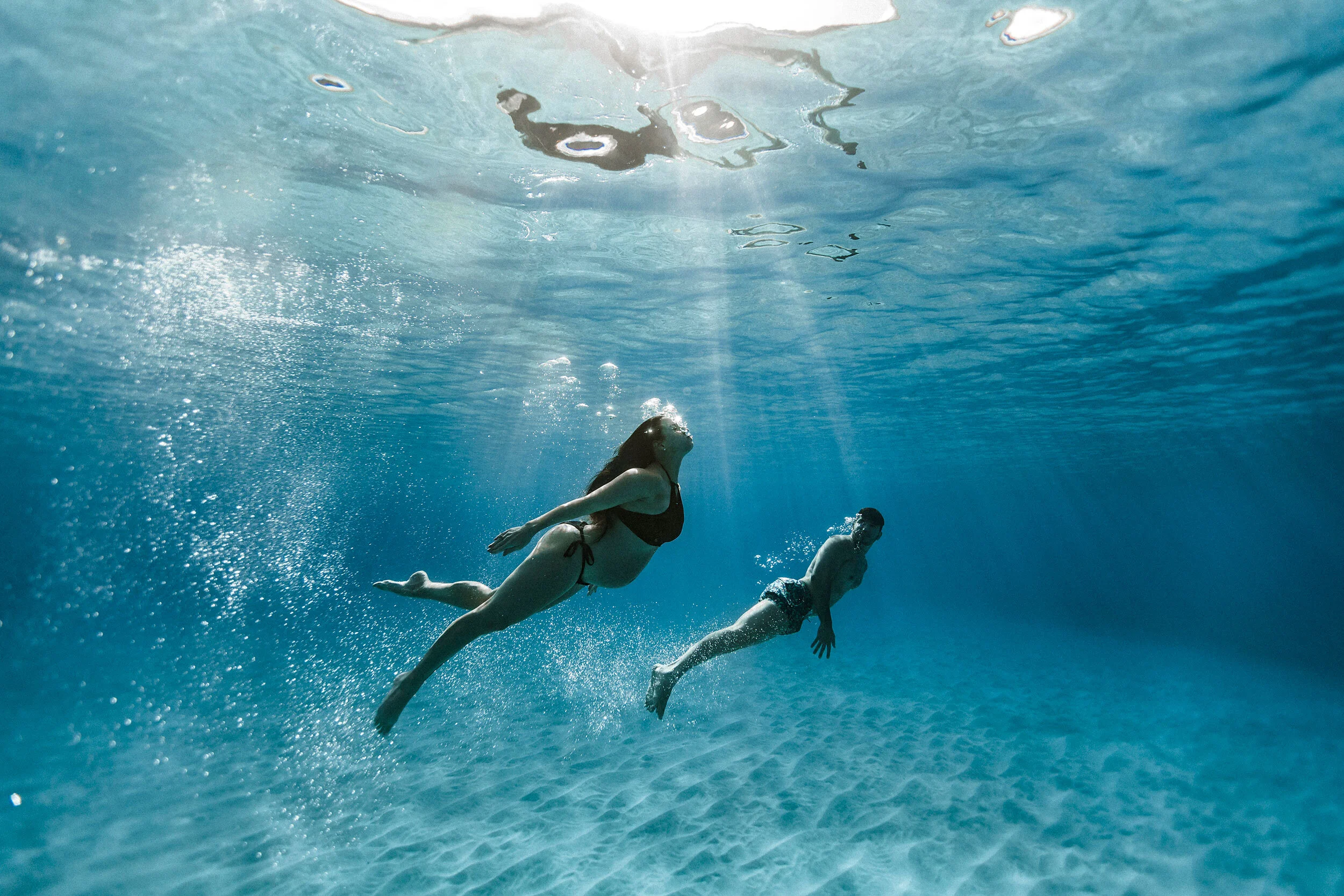 Crystal Waters for their Babymoon | Oahu Hawaii Maternity + Underwater Photographer