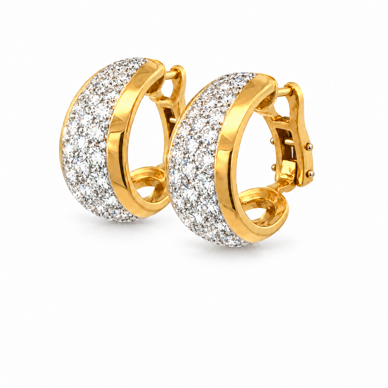 Diamond gold earrings on white.png