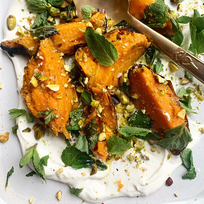 Charred Sweet Potatoes with Lemon Yogurt, Pistachios, and Mint. 