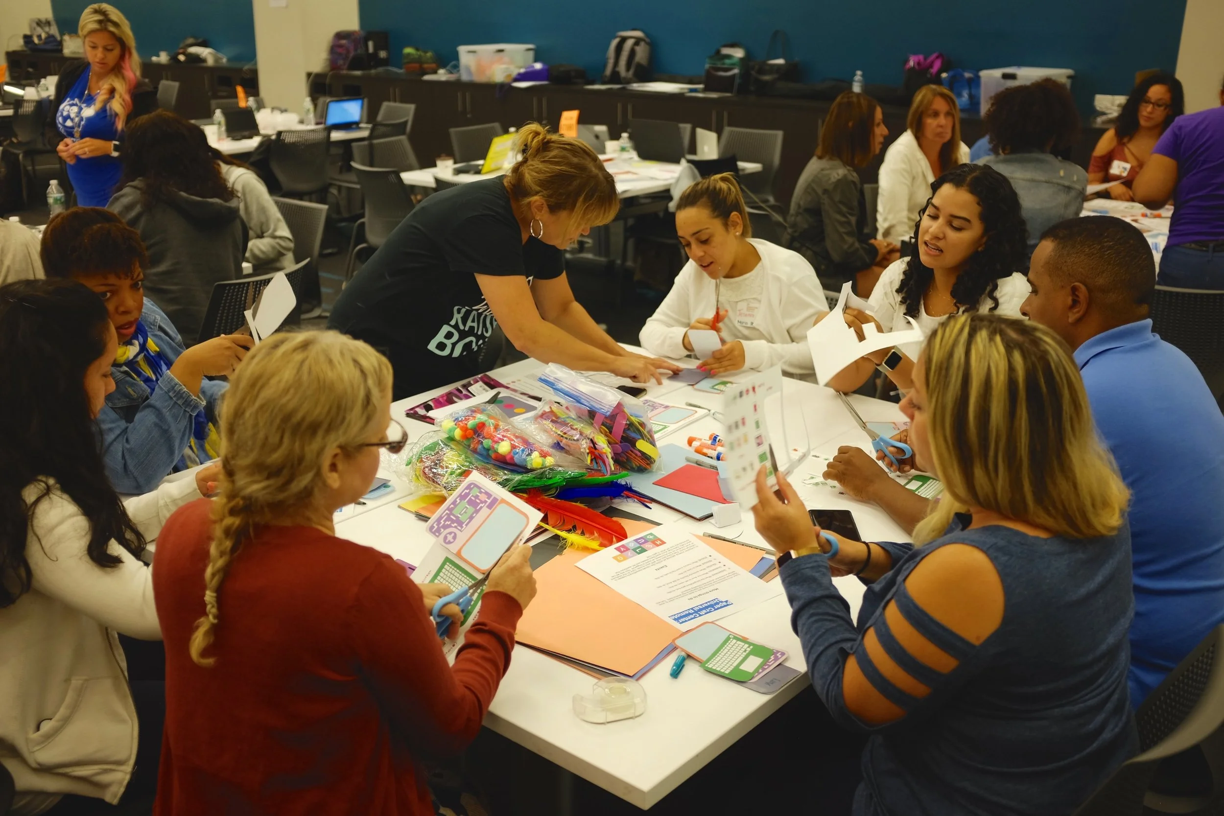 Teacher trainers are more experienced teachers in CS who help to facilitate and lead PD sessions offered by the CS4All team