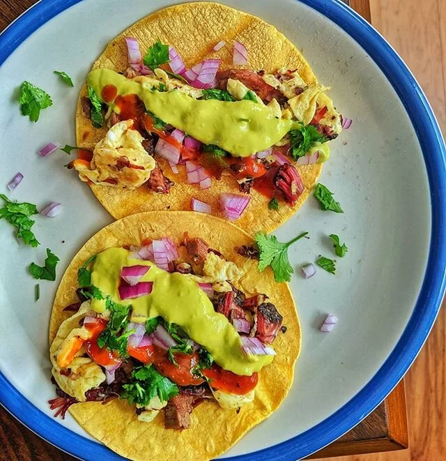 Saturday Morning Fuel 💨Being a Texan means breakfast tacos is a must. This here is brisket from @valentinastexmexbbq scrambled with some eggs and served over corn tortillas. Add some onions, cilantro, a squirt of lime and your fave sauces!

What's y