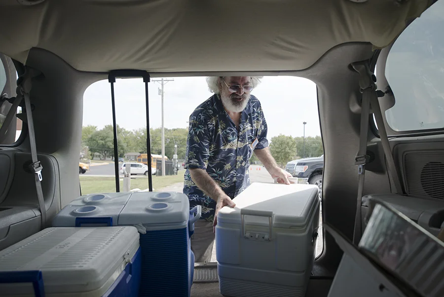 Morrison loads coolers full of produce into his van at the Columbia Farmer’s Market on Saturday, September 9. Many of the producers at the market know him well, and are familiar with his “Hello! Anything you’d like to pass on today?” as Morrison works through the market just before it closes for the day. Food Not Bombs in Columbia works entirely from donations, and even the coolers themselves were given to the cause.