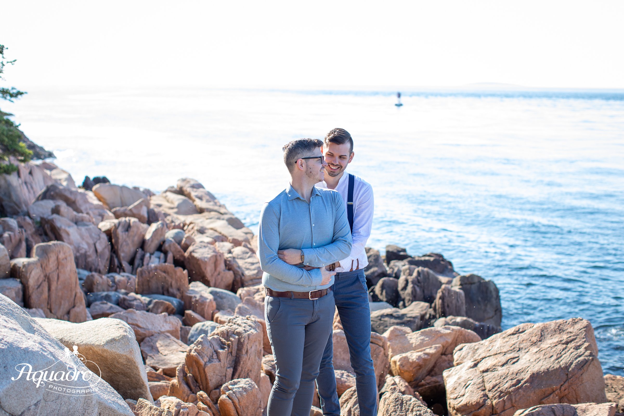 Engagement Session on rocky beach and near lighthouse in Maine