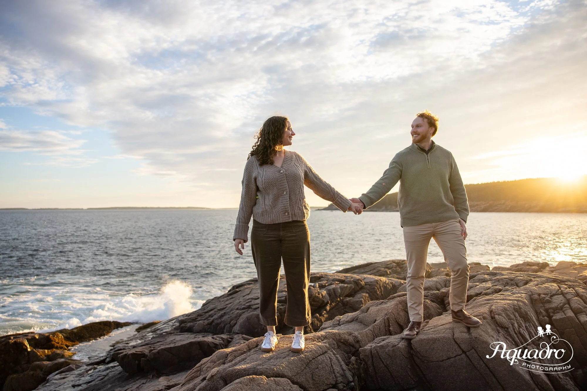 couple on ocean path on mount desert island for an engagement couples photography session