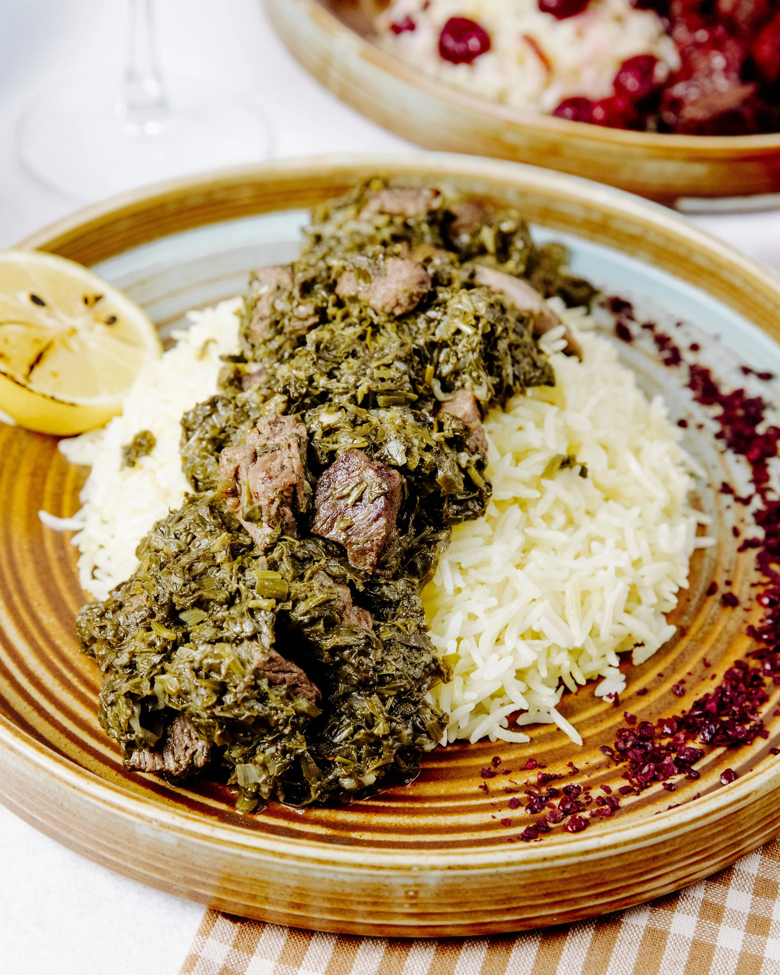 side-view-pilaf-with-stewed-meat-herbs-spices.jpg