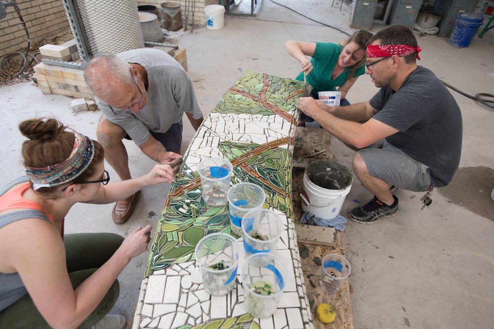  An alternate view of students and me grouting the tiles.  Photo by Michael Spooneybarger 