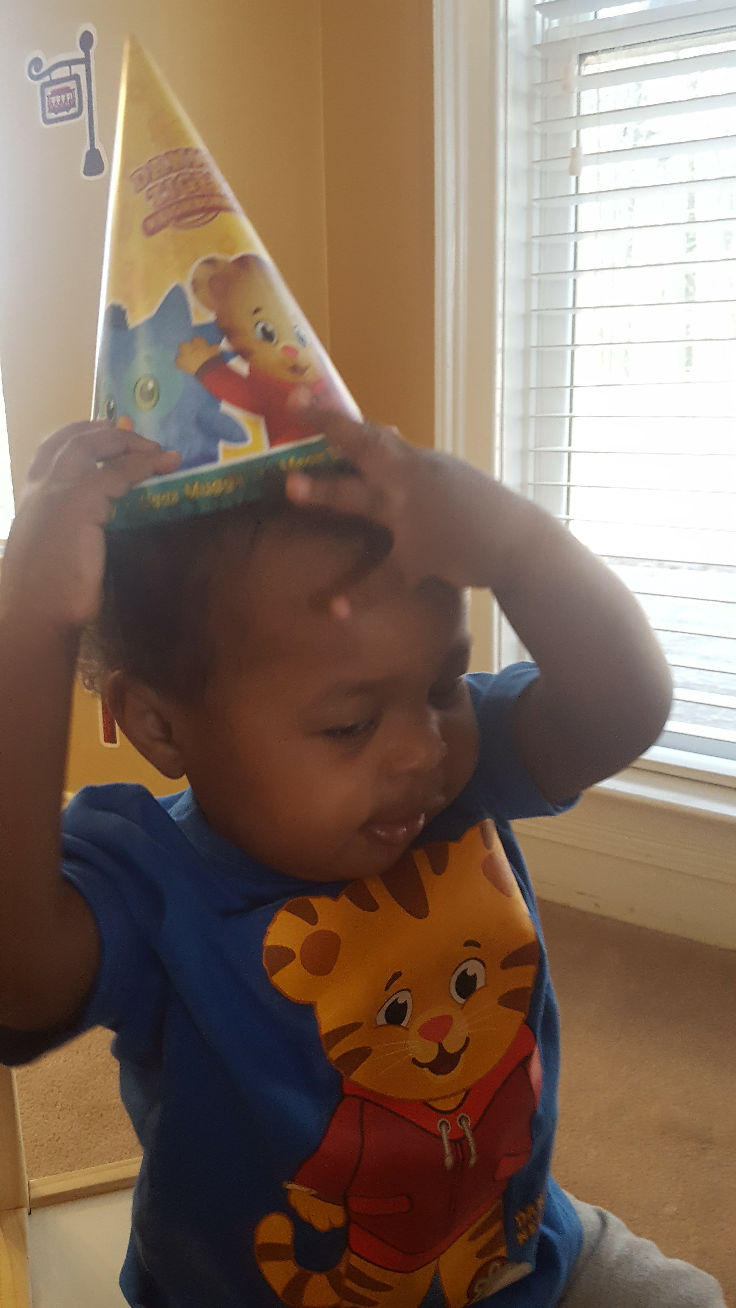 Birthday boy with cone hat