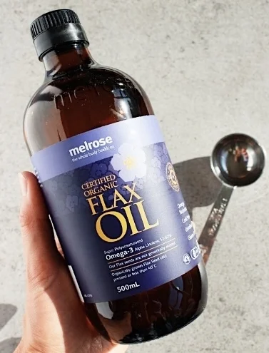Melrose certified organic flaxseed oil (I currently use and love) & a tablespoon.