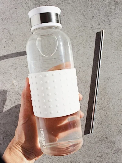 Water bottle from Coles. Re-usable straw from Just Blends.