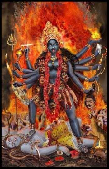 Goddess Kali Ma stands atop Shiva with a garland of demon heads in the ultimate representation of feminine power.