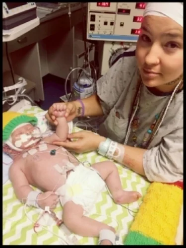 August 2016: Sitting at my Sun's bedside as he lay on life support in the Neonatal Intensive Care Unit.