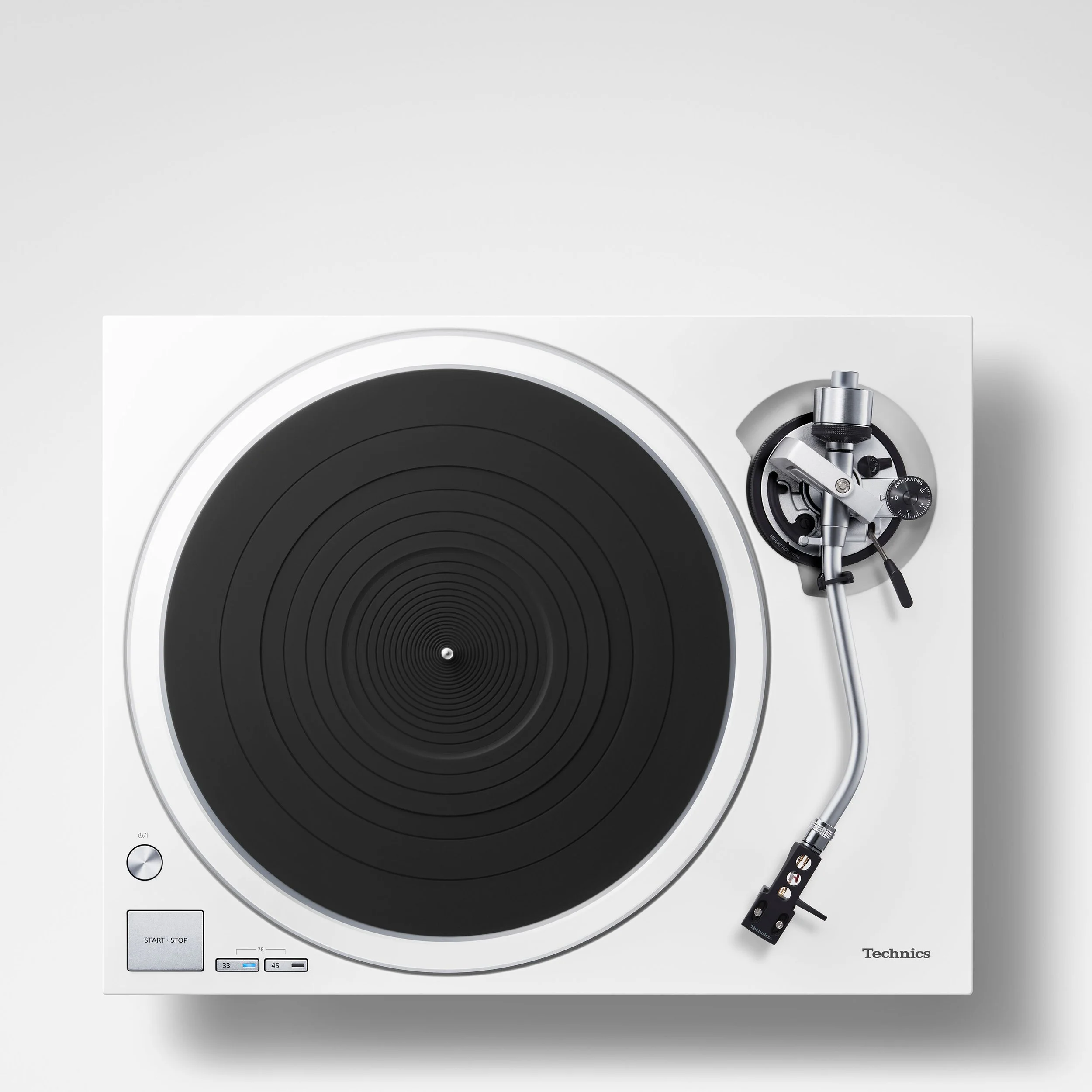 Top view of the Technics SL-1500C direct drive turntable shown in white.