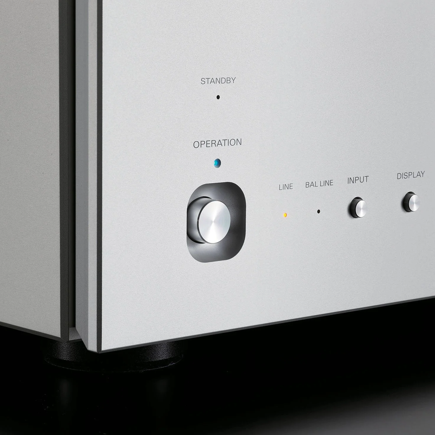 Close-up view of the front panel of the Luxman M-10X power amplifier.