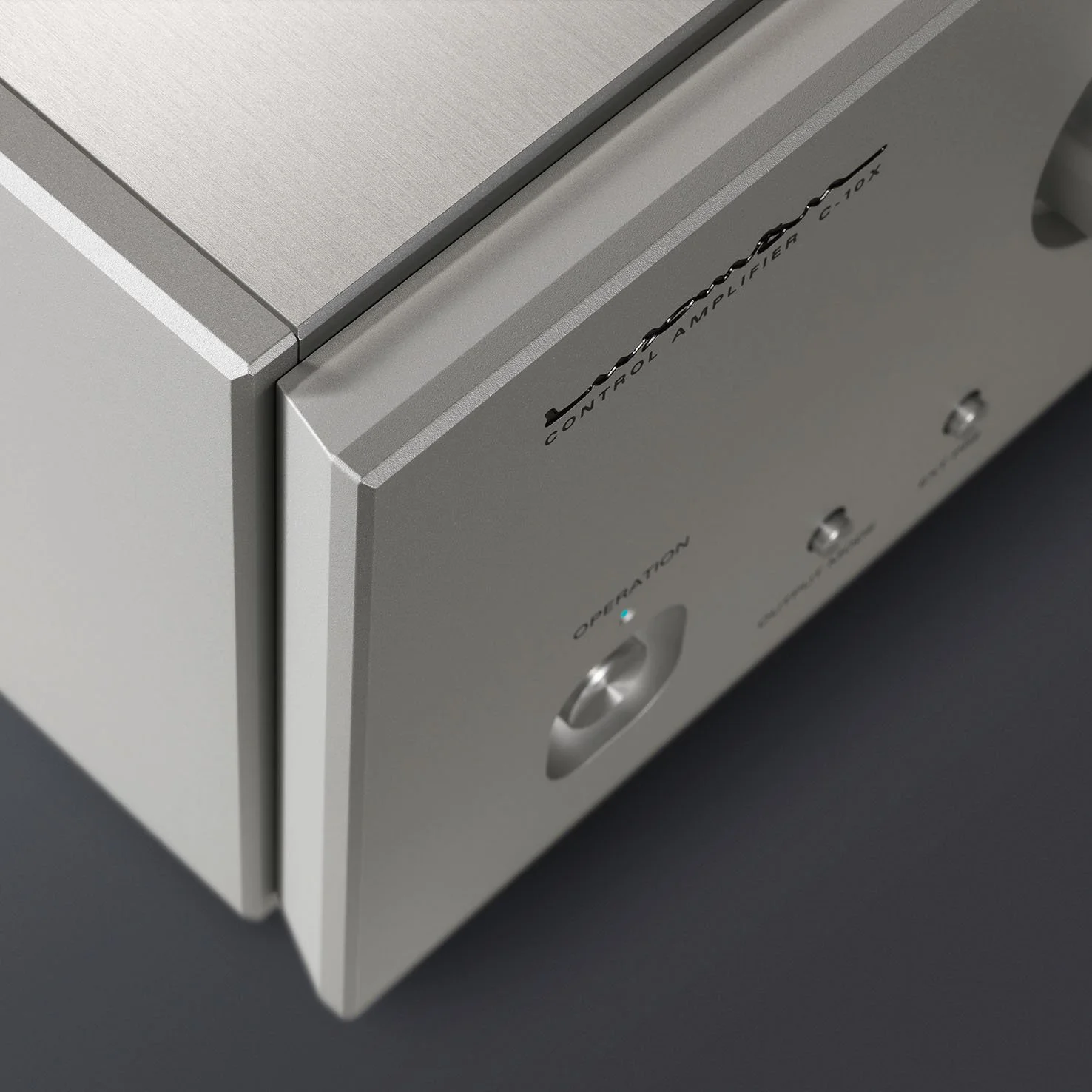 Close-up detail of the front panel construction of the Luxman C-10X preamplifier.
