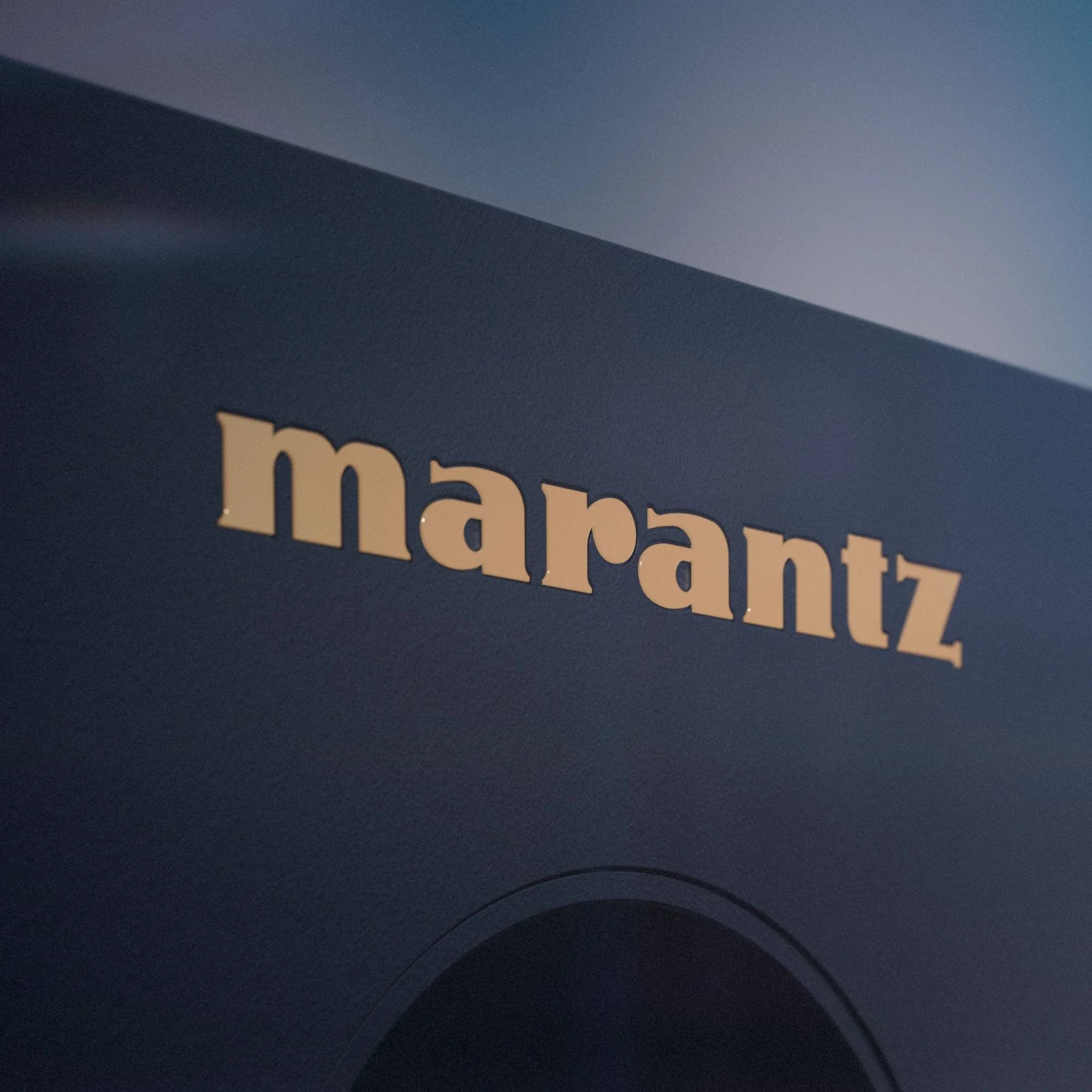 Close-up detail of the Marantz logo on an AV surround sound receiver.