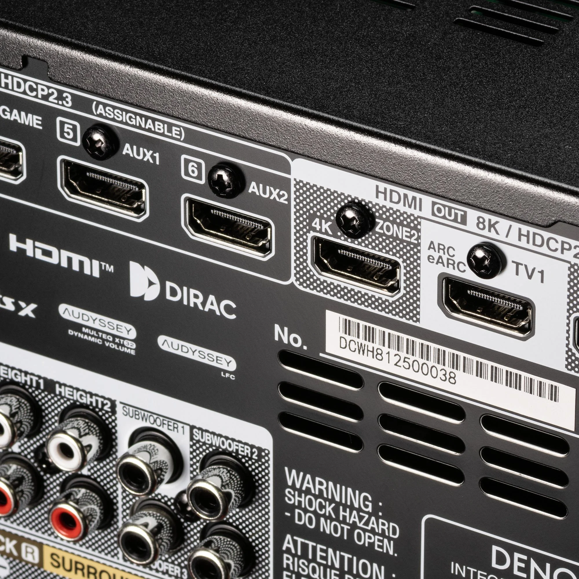 Close-up detail of the 8K HDMI connections on a Denon AV surround sound receiver.
