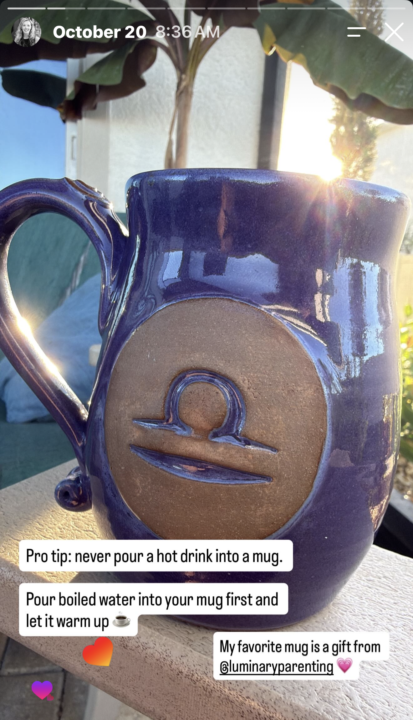 Libra symbol on a handcrafted purple painted mug in the sun on the porch in Florida