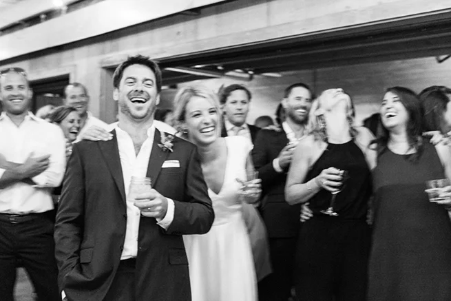 39-bride-groom-laughing-speeches.jpg