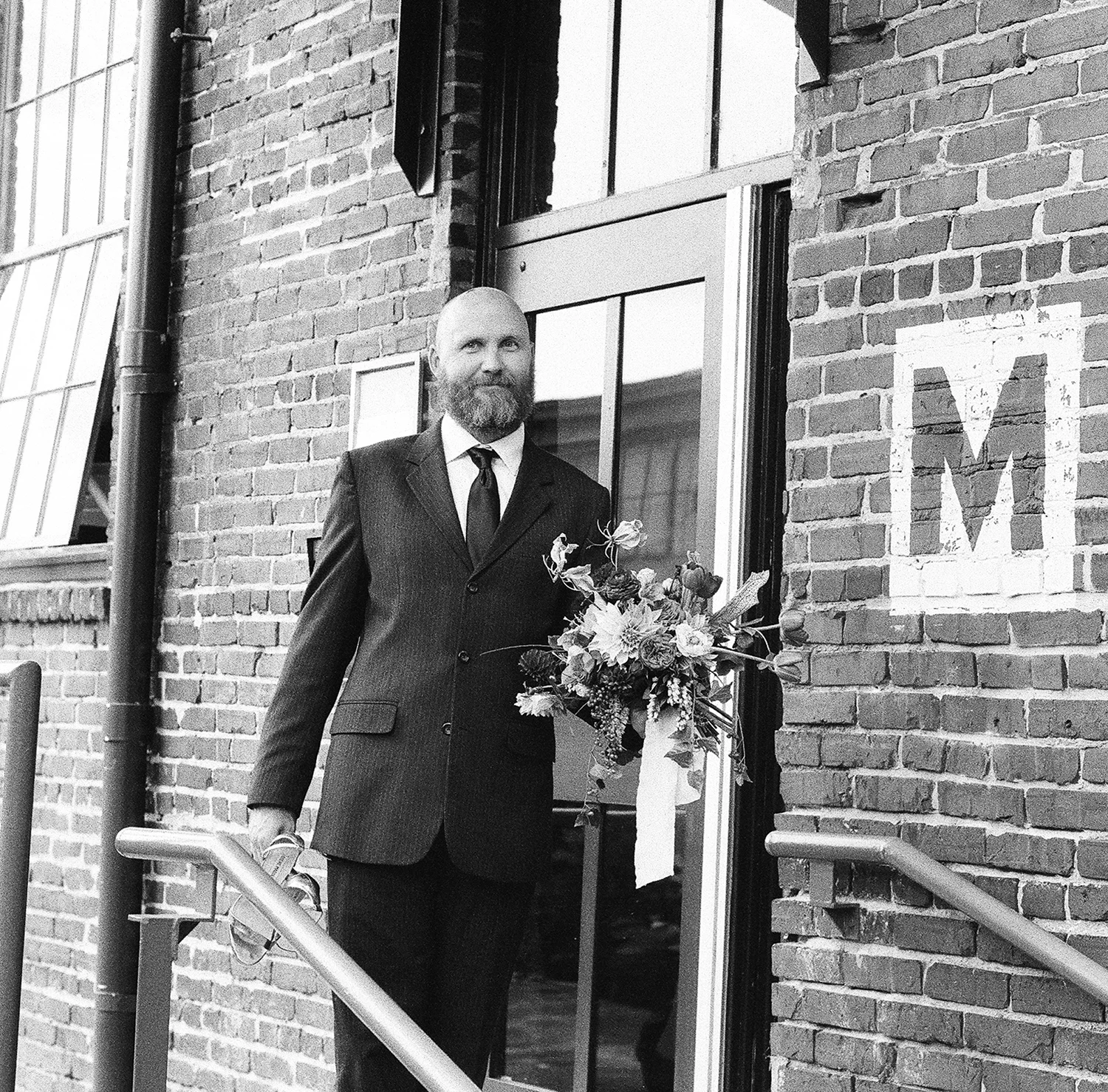 22-man-holding-bouquet.jpg