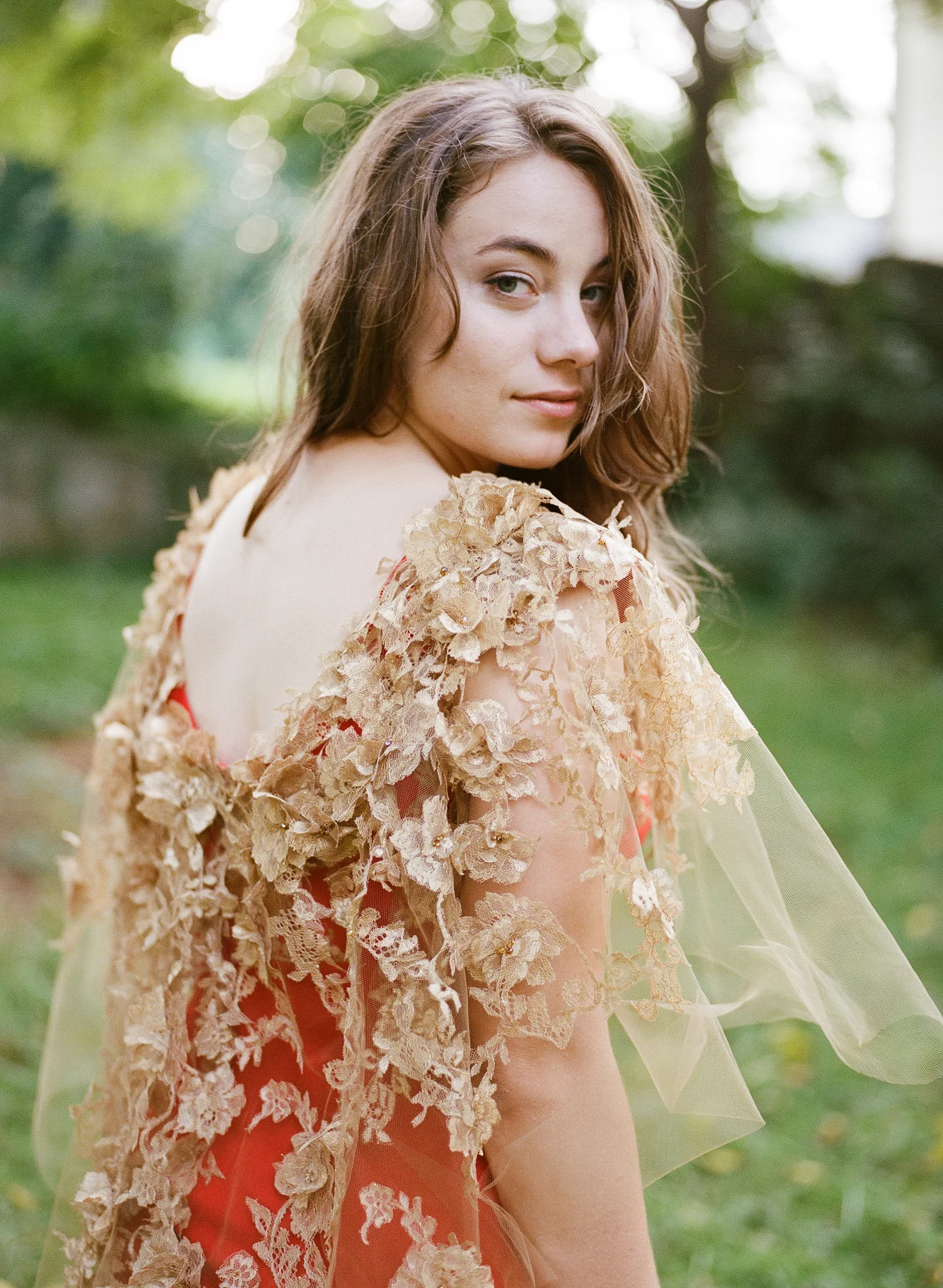 26-red-dress-gold-capelet.jpg