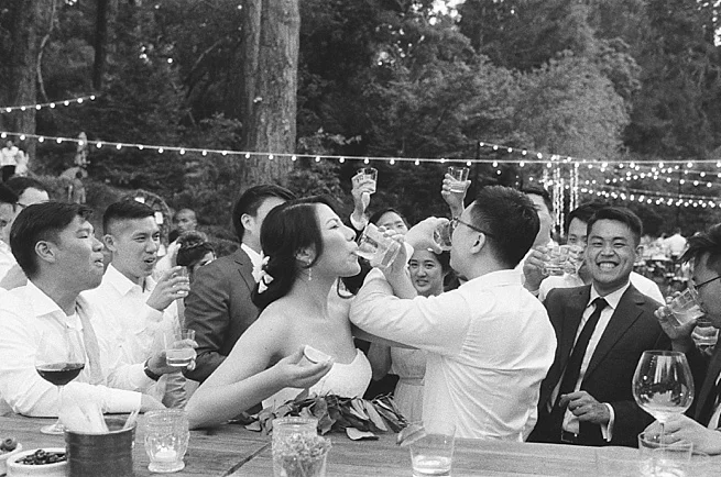 57-bride-groom-take-shots.jpg