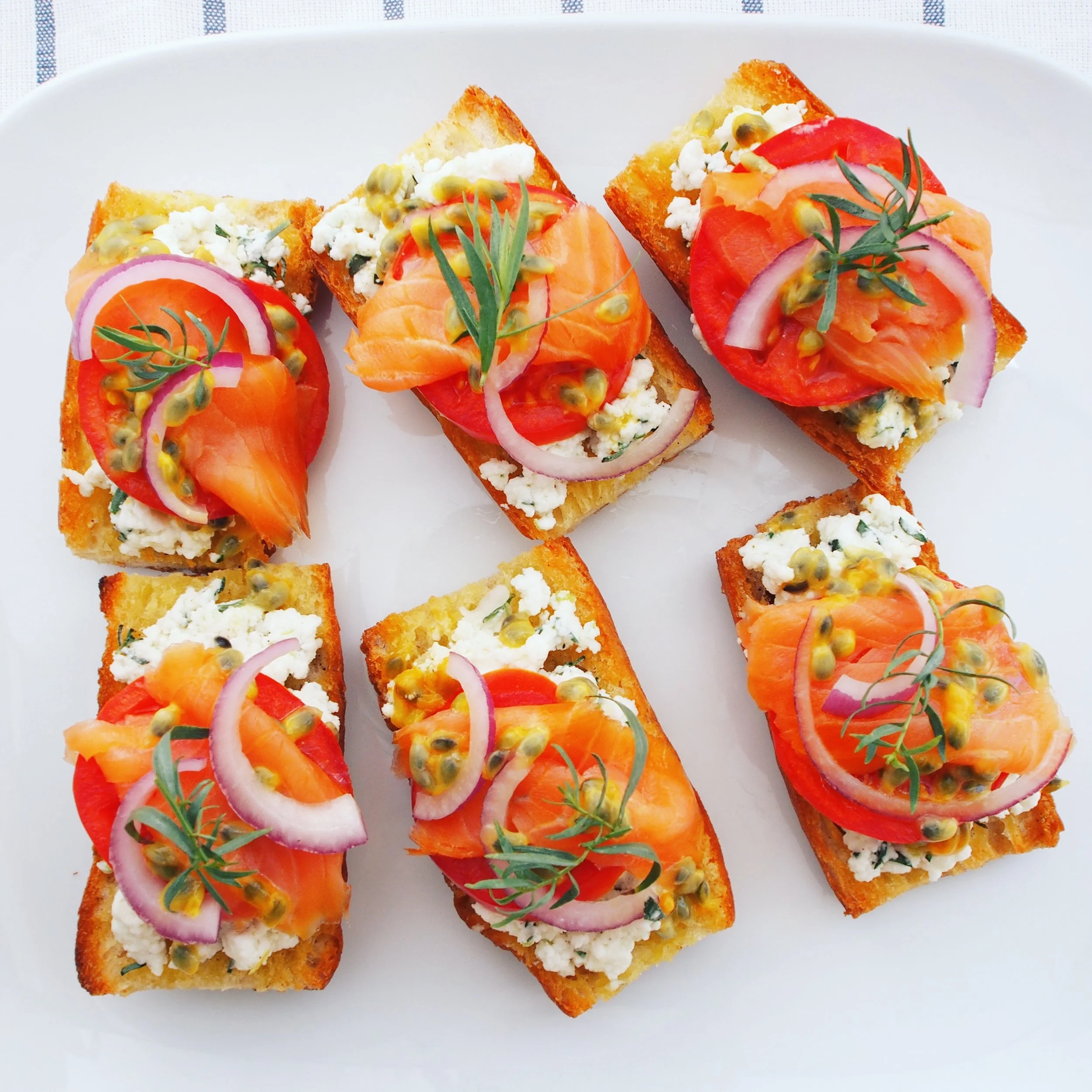 Real California MIlk queso fresco pairs perfectly with lox toast and slices of tomatoes, onions, tarragon, and a squeeze of lemon! A healthy snack idea that incorporates dairy!