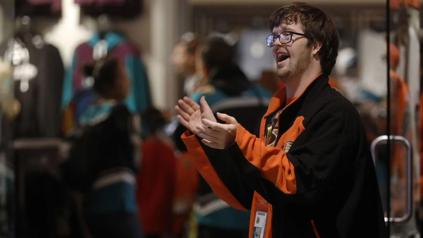 Trevor cheering on his Anaheim Ducks while hard at work as their Team Store Greeter.