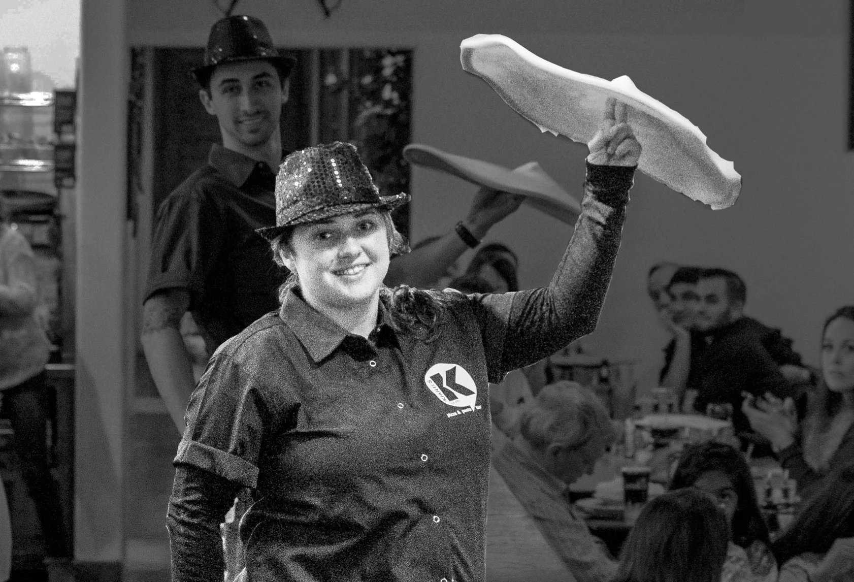 SHAYLIN 'SHAY' NORTON Shaylin started working at Kianti's 2012 and loved doing the Friday and Saturday night performances, right from the start. She performed as a dancing server for a few years, but always showed interest in learning how to toss dough. She would practice almost every night after work until she felt confident enough to perform as a pizza spinner. That was 3 years ago, and since then, Shay, has been our only female pizza spinner, playing the part of Mrs. Clause for some of our holiday shows. You can also see her at a few Santa Cruz Warrior games performing dough-tossing tricks during the Kianti's pizza dash. 