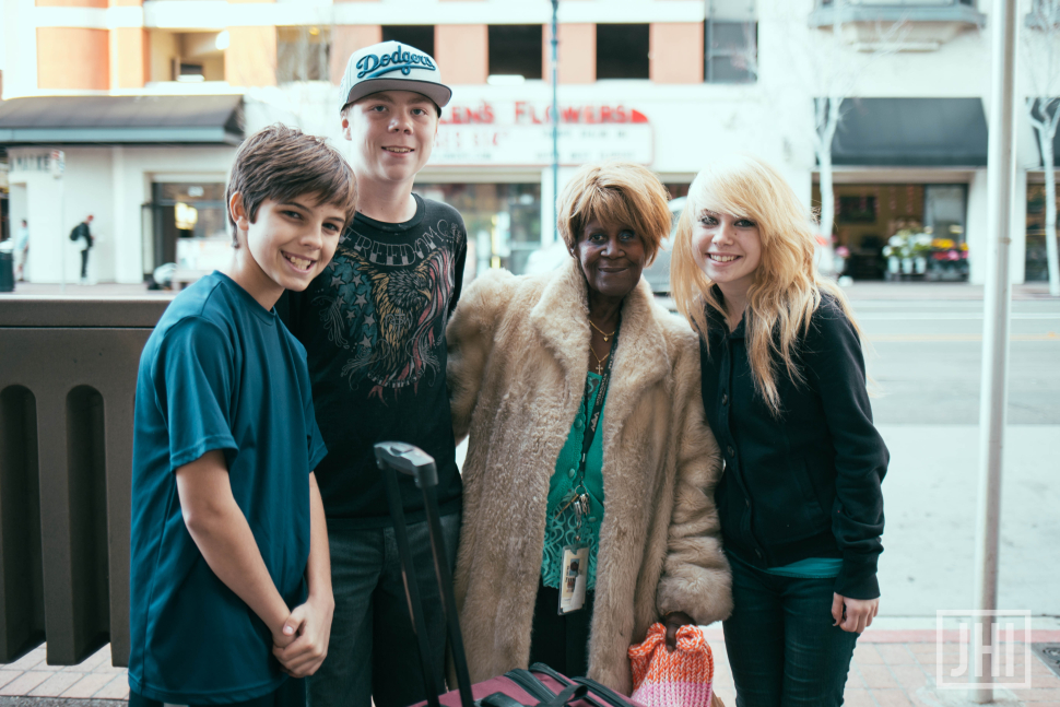 Our students helped this lady carry her luggage a couple blocks to a bus stop. We even got to pray for her!
