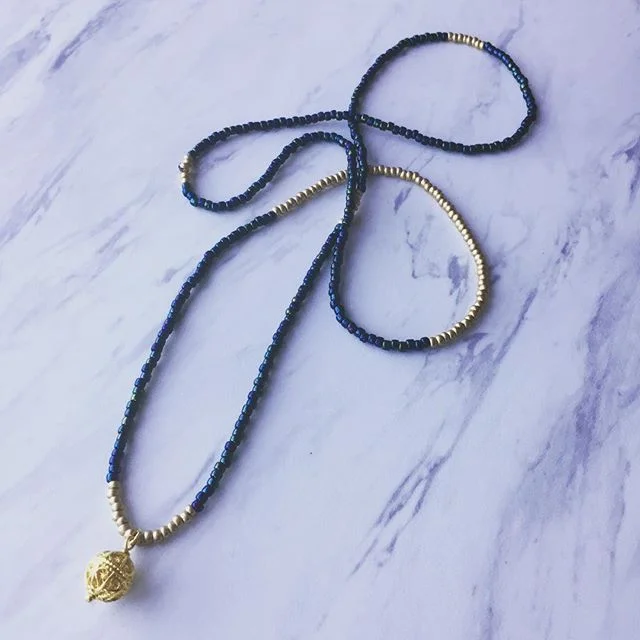 Beat the bulk of winter with this light and lean Rock &amp; Lulu necklace.
#rockandulu #jewelry #jewelrydesigner #necklace #blueandgold #accessories #oneofakind #modernandclassic #hipandtrendy #nyc