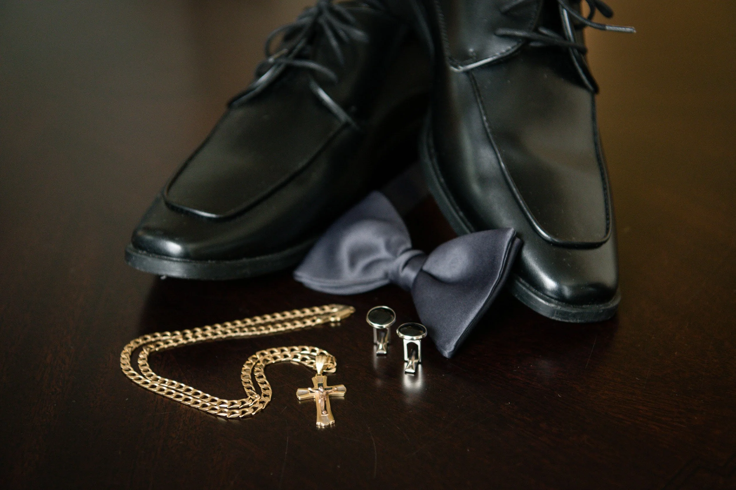Groom’s shoes, cufflinks, and jewelry detail at Valley Regency wedding