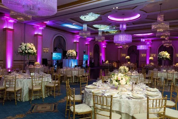 Reception ballroom with purple lighting at The Grove captured by Jason Giordano Photography