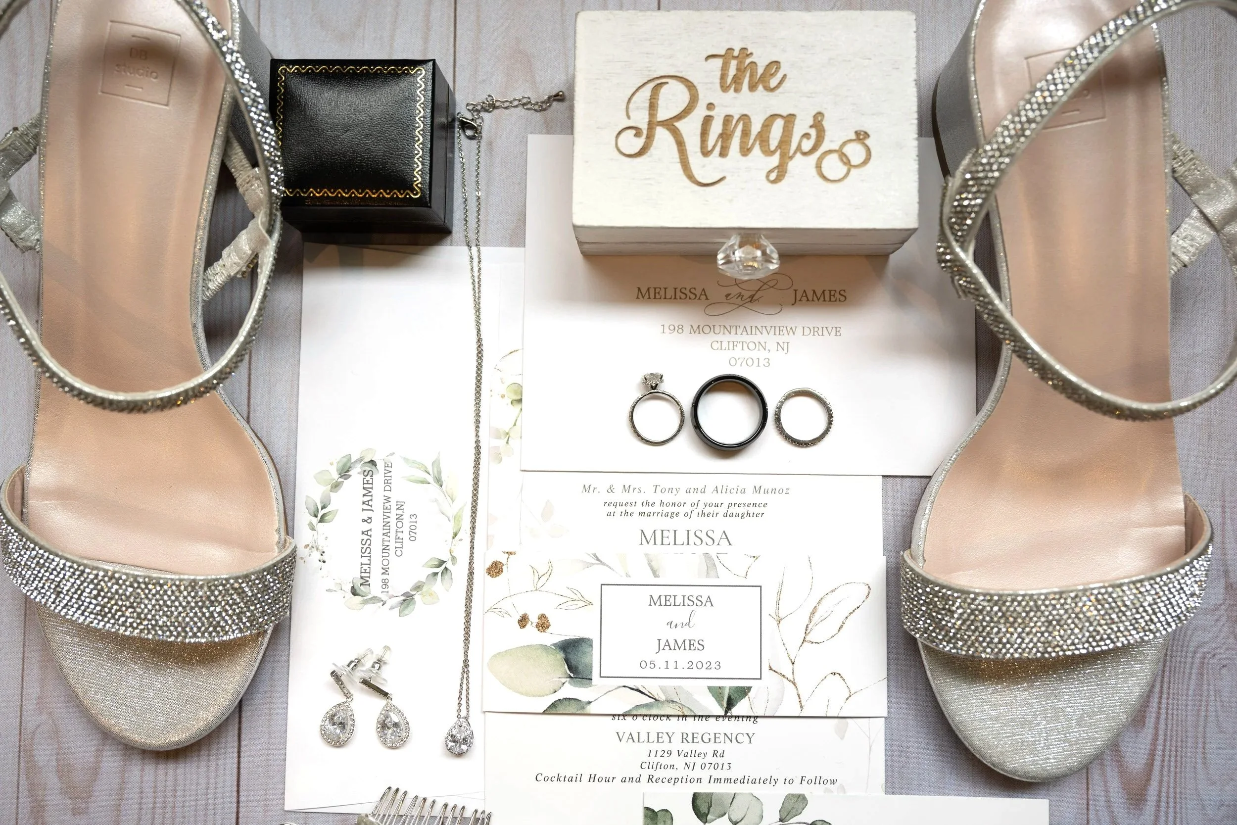 Valley Regency wedding detail shot of bridal shoes, jewelry, and invitation flat lay