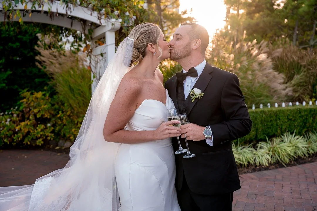 Bride and groom sharing a quiet moment during portraits at Mallard Island Yacht Club
