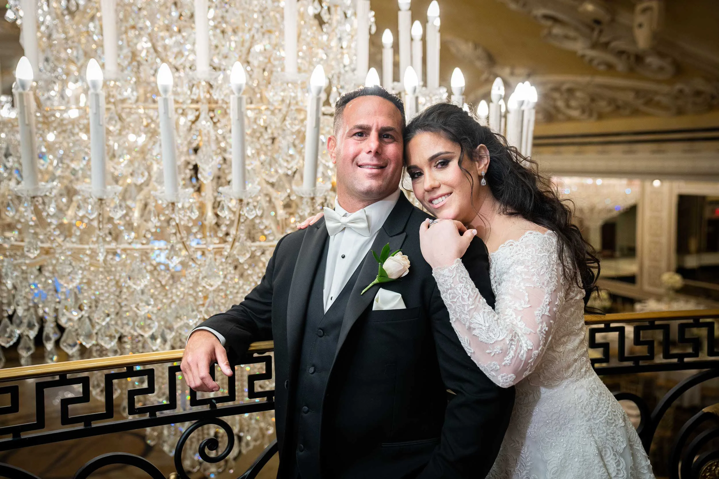 Wedding Photography Pricing in NJ – bride and groom portrait under a chandelier