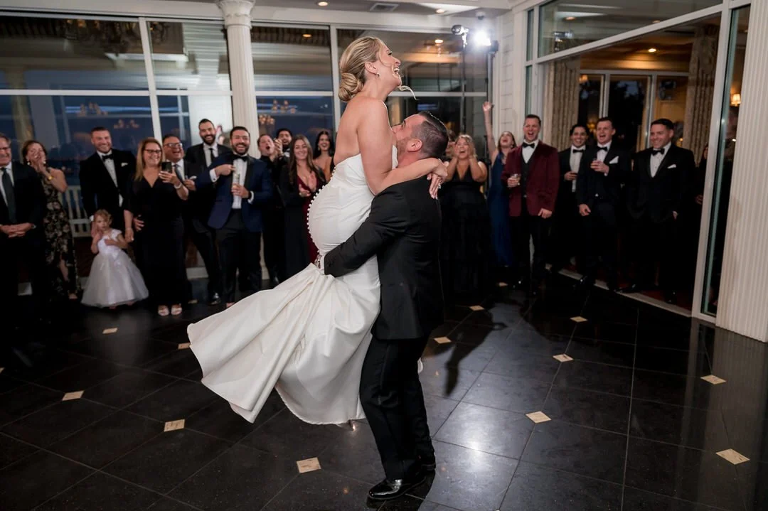 Bride and groom dancing during their wedding reception at Mallard Island Yacht Club