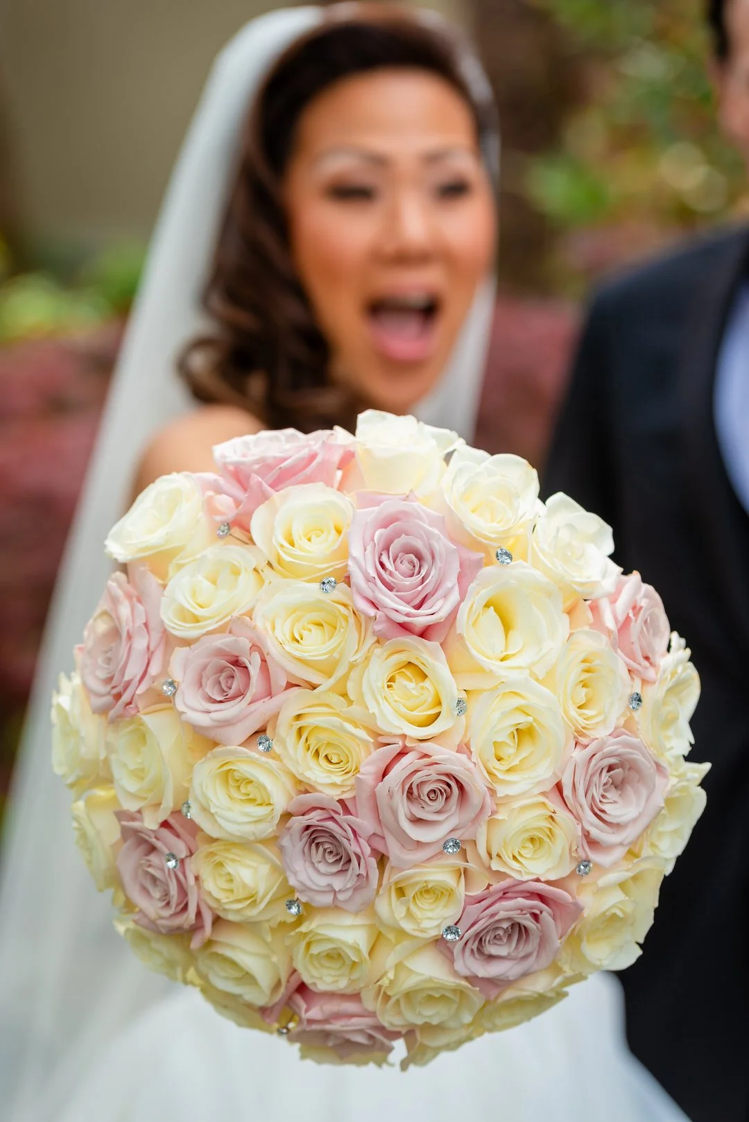 Close-up of pink and ivory rose bridal bouquet at a Westmount Country Club wedding.