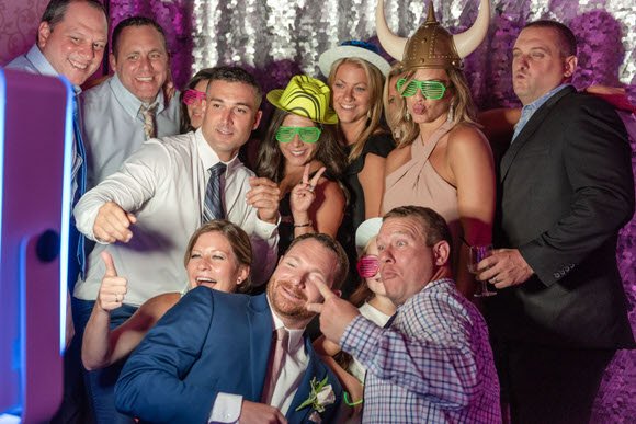 Guests smiling and celebrating at a North Jersey wedding reception