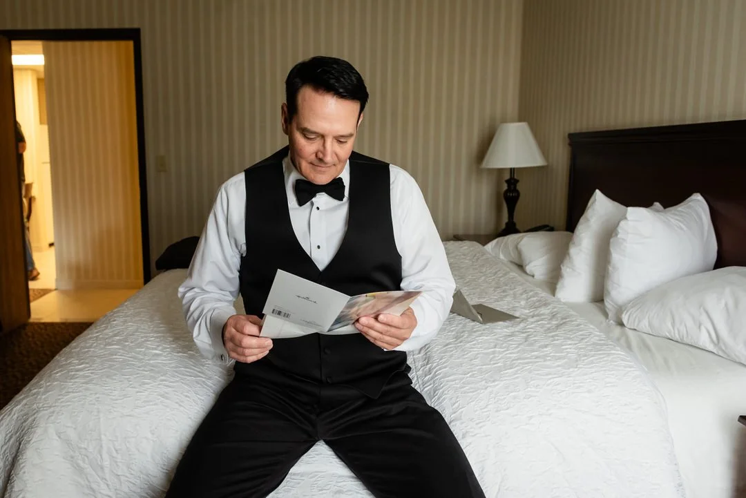 Groom reading a heartfelt wedding day letter at Westmount Country Club.