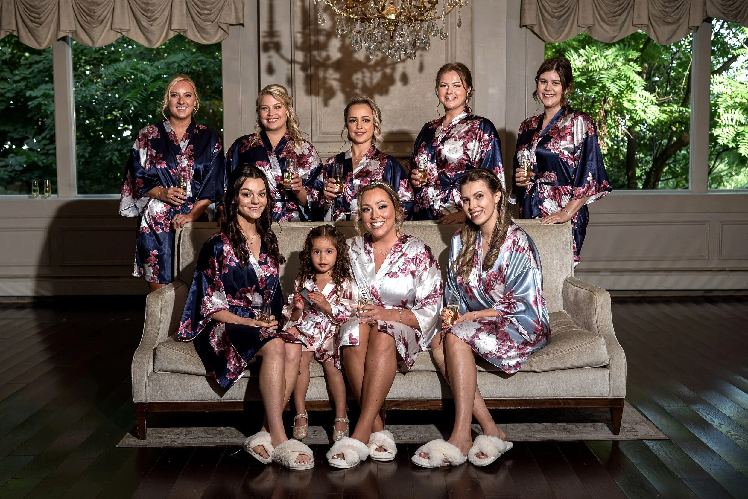 Bridal party in matching robes before ceremony at Valley Regency bridal suite