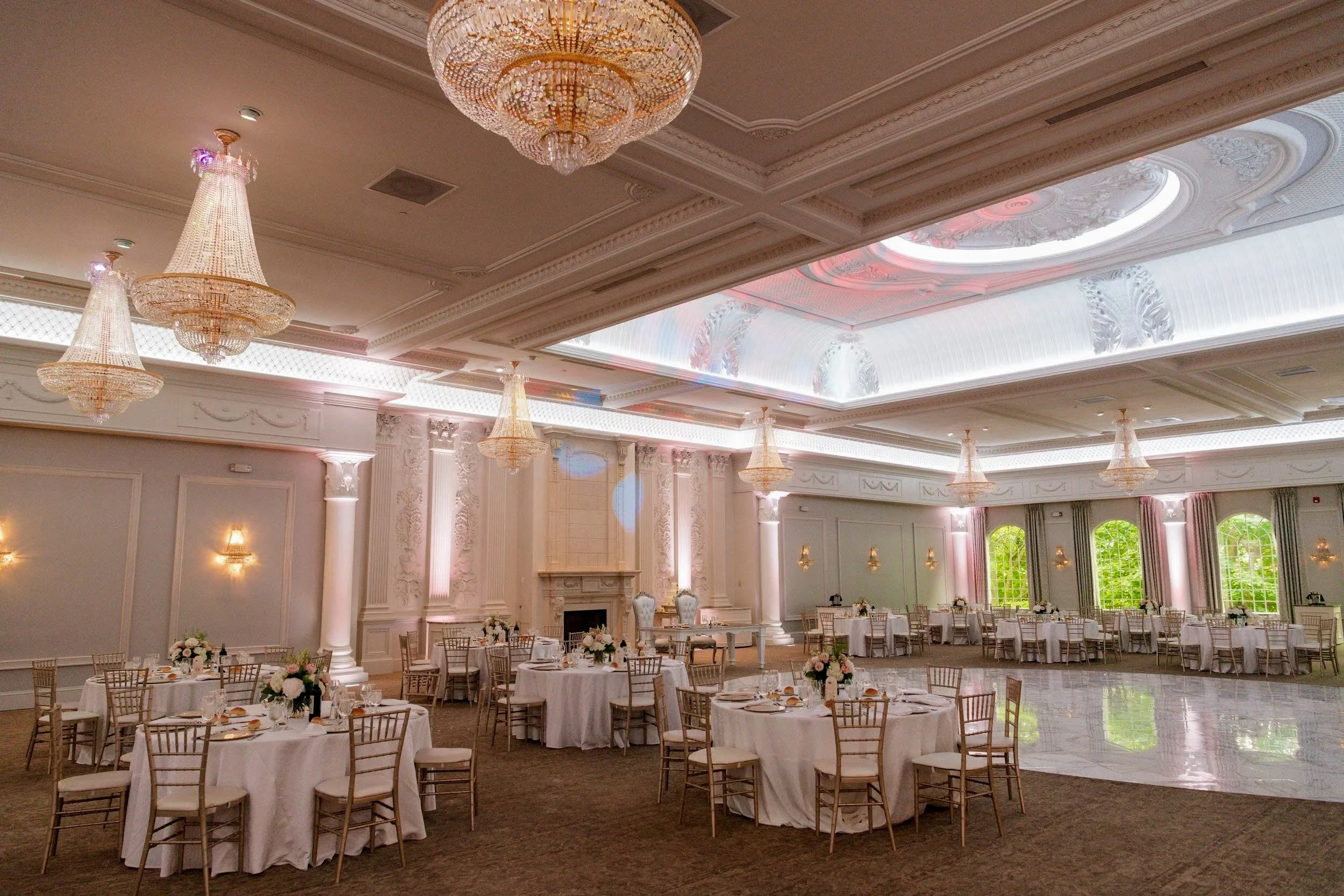 Valley Regency grand ballroom decorated for wedding reception with chandeliers