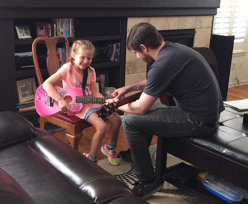 Tony with Guitar Student
